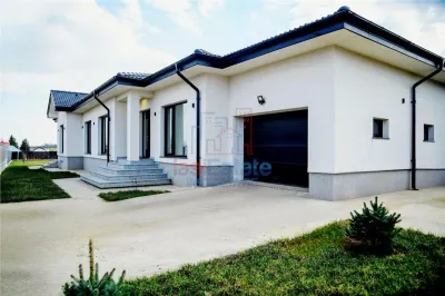 Casa intr-o zona linistita cu garaj si teren-1091 mp - Valea Ursului