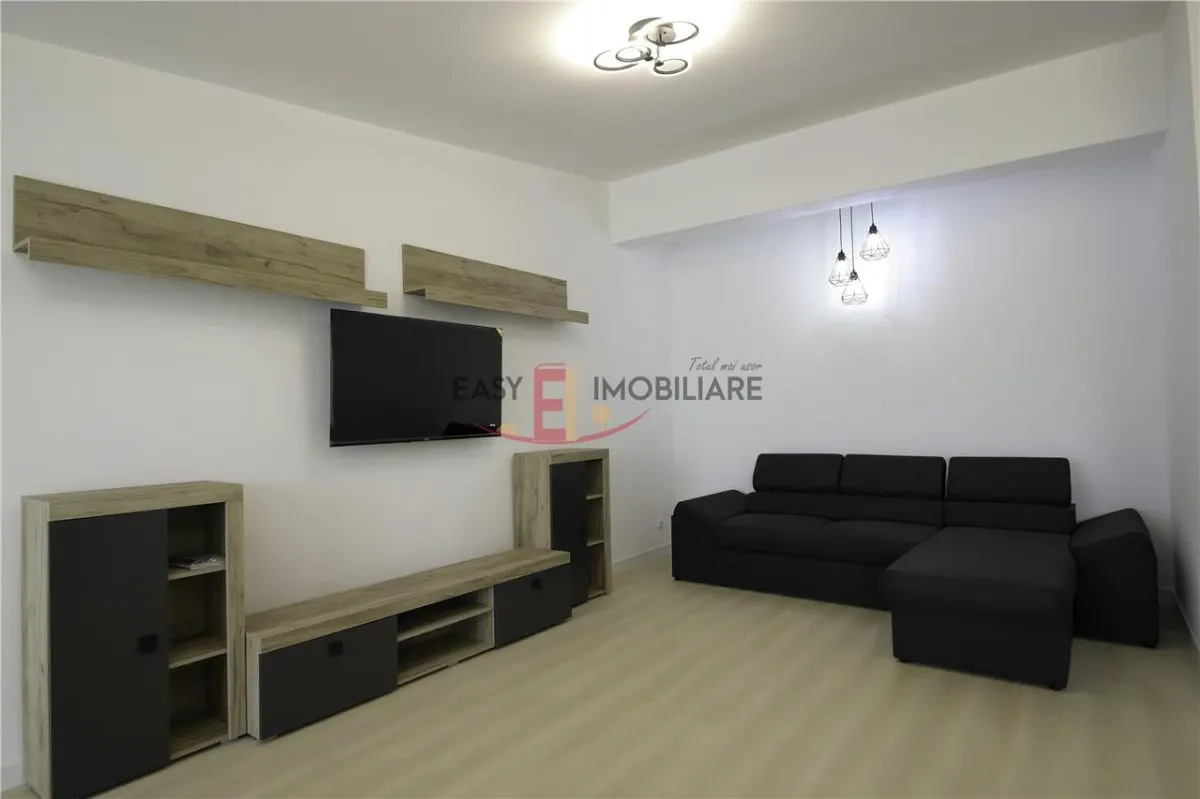 Apartament cu 2 camere Central, bloc nou et1, AC,Prima închiriere, parcare subterana - foto 1