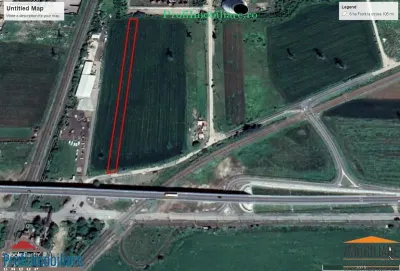 Teren 5.000 mp pentru diverse activitati cu acces din sosea strada Ovidiu in fata la CET Arad - Arad