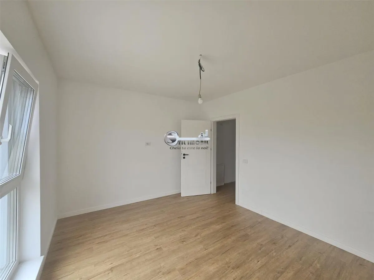 Apartament 3 camere dispus pe 2 niveluri - foto 3