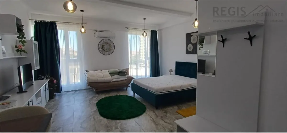 Garsoniera moderna si apatioasa - foto 1